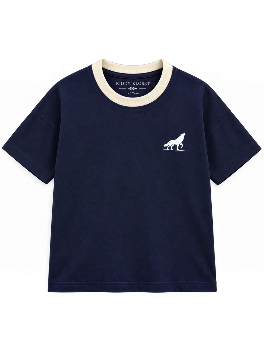 Kiddy Kloset kids navy drop shoulder T-shirt front view with contrast cream ribbed neck and white wolf logo