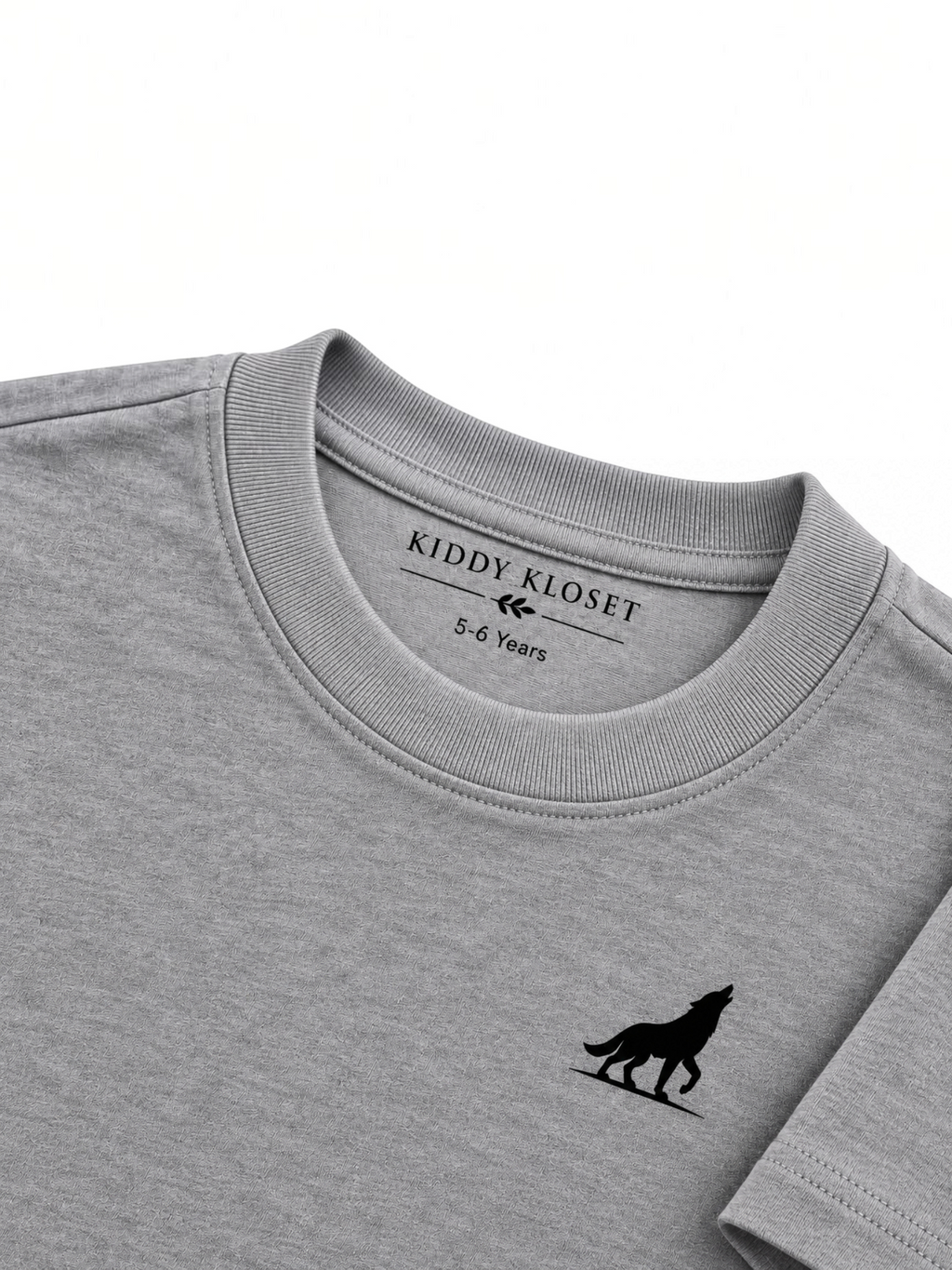 Close up of tonal grey ribbed crew neckline, branded neck print and black wolf logo