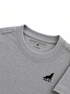 Close up of tonal grey ribbed crew neckline, branded neck print and black wolf logo