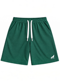 Kiddy Kloset kids forest green shorts front view with white drawcord and white wolf logo