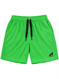 Kiddy Kloset kids parrot green shorts front view with black drawcord and black wolf logo